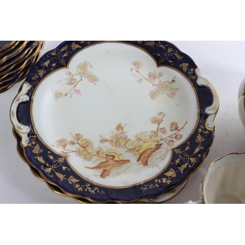 394 - A stunning antique bone china tea set decorated with birds (a/f).