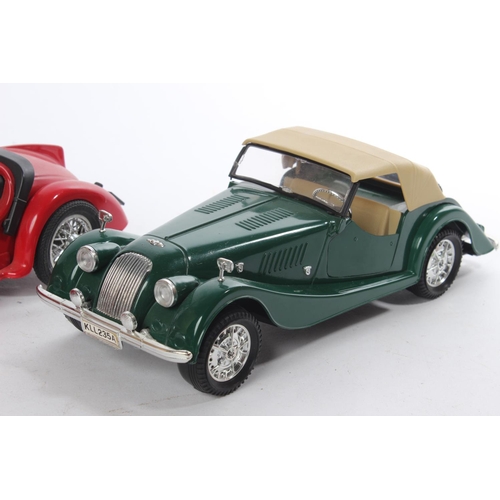 508 - Two antique style collectors cars.