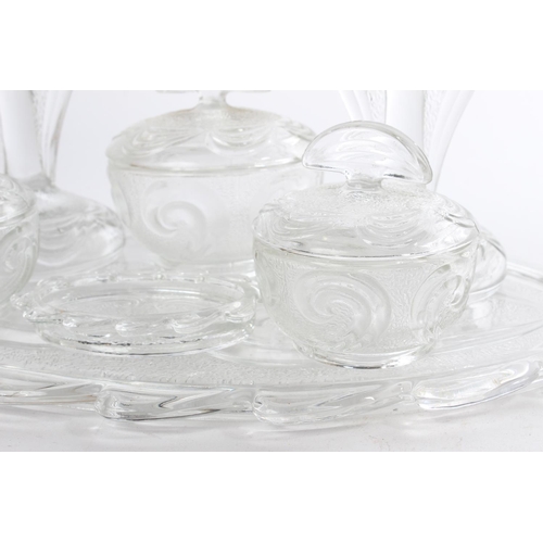 509 - A vintage pressed glass dressing table set.