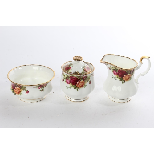 514 - A Royal Albert Old Country Rose milk jug, sugar bowl and preserve pot.