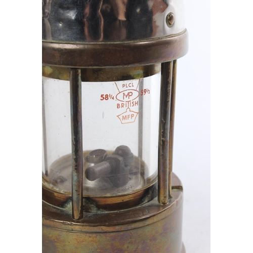 521 - An antique brass and metal miners lamp, maker 'The Protector Lamp & Lighting Company'.