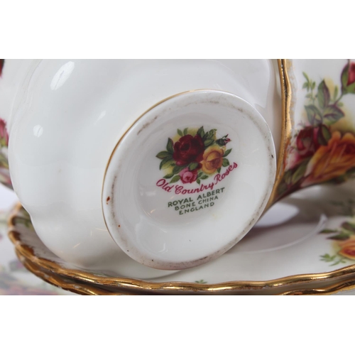 522 - A twelve piece Royal Albert Old Country Rose coffee set.