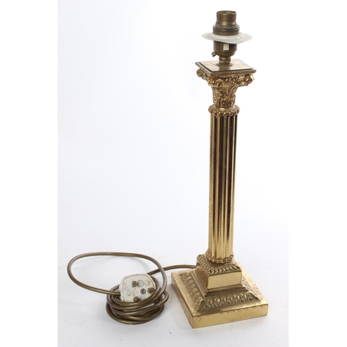 540 - An antique Corinthian brass table lamp base, measuring approximately 16