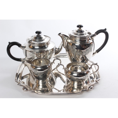 545 - A Walker & Hall silver plated tea and coffee service on a footed tray.