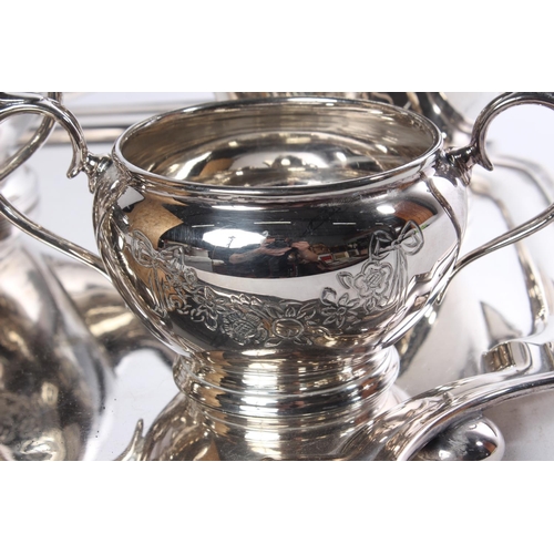 545 - A Walker & Hall silver plated tea and coffee service on a footed tray.