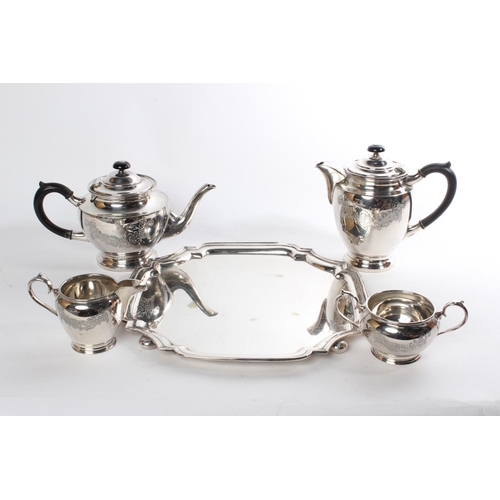 545 - A Walker & Hall silver plated tea and coffee service on a footed tray.