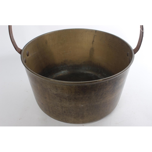 548 - A large antique brass preserving pan.