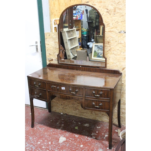 550 - A vintage mahogany dressing table and mirror.