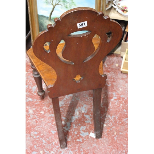 551 - An Antique mahogany shield back hall chair.