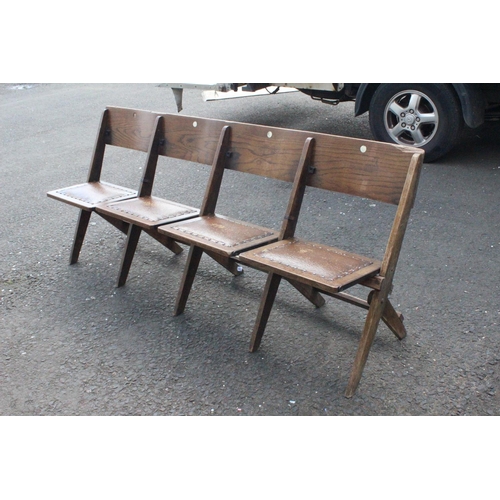 583 - A vintage folding bench of 4 folding seats.