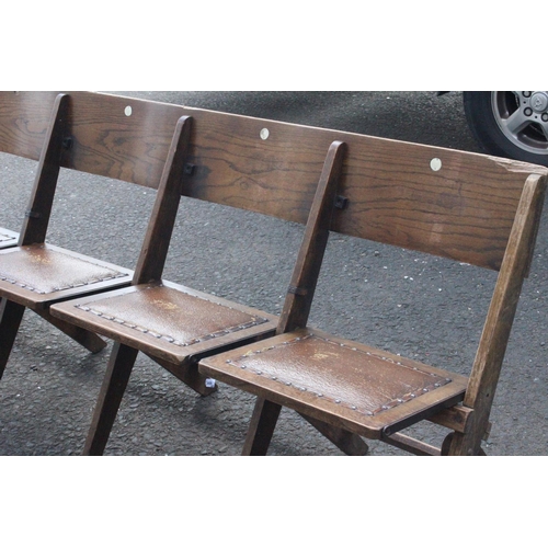 583 - A vintage folding bench of 4 folding seats.