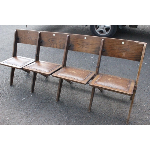 583 - A vintage folding bench of 4 folding seats.