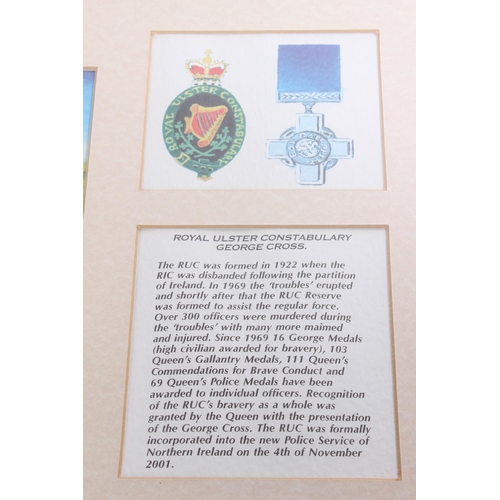 585 - A framed Royal Ulster Constabulary - George Cross picture display.