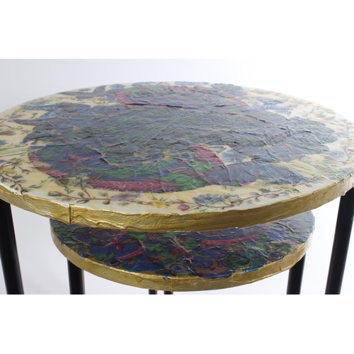 598 - Two decoupage topped circular tables on metal bases.