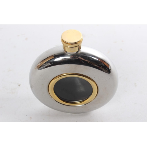 605 - A brass and stainless steel hipflask.