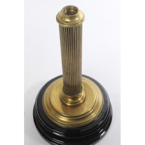 606 - An antique oil lamp base.