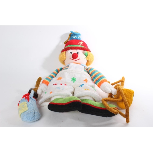 613 - A handknitted clown.