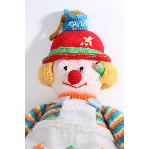 613 - A handknitted clown.