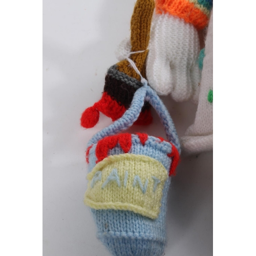 613 - A handknitted clown.