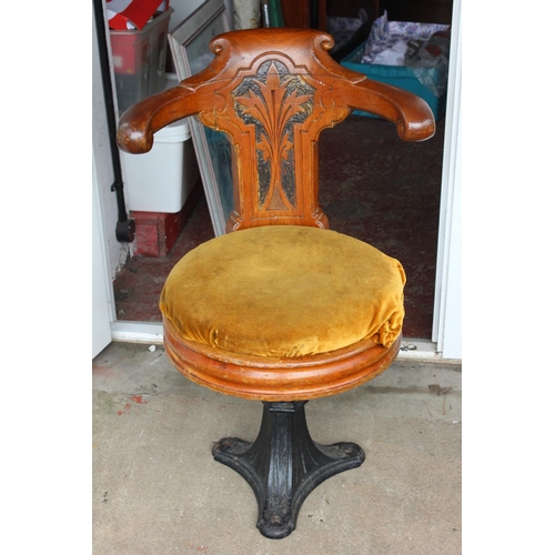 615 - A stunning antique cruise ship/ liner dining chair, with decorative cast iron base & highly carved f... 