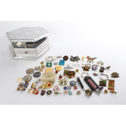 635 - A metallic style jewellery box and a very large lot of collectors badges and more.