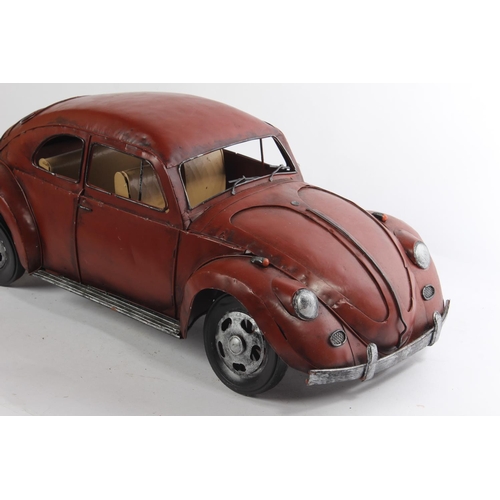 646 - A large metal 'Beetle' car, measuring 20