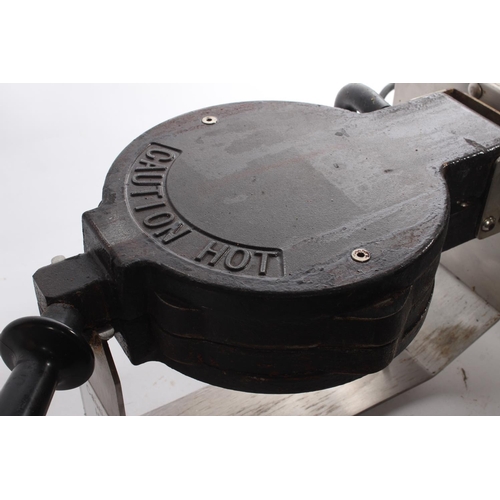 650 - An electric Sephra waffle maker, untested