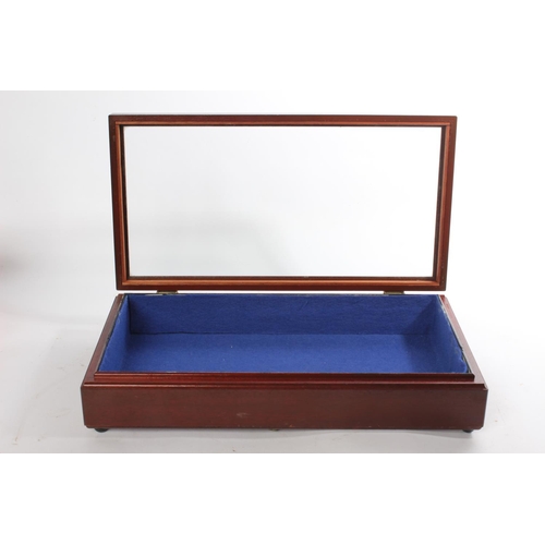 651 - A small table top display box, measuring 41cm x 22cm x 8.5cm.