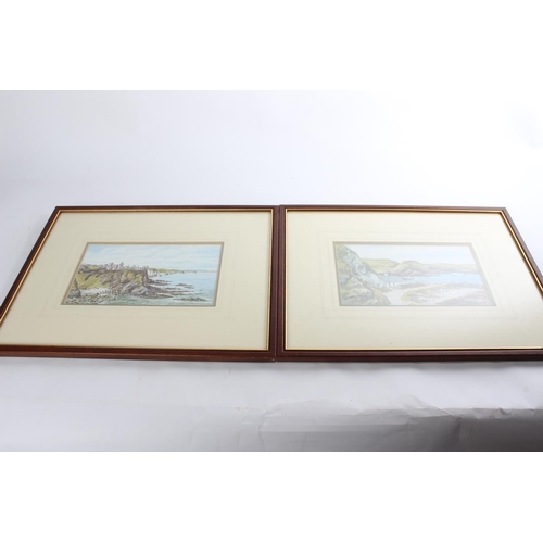 653 - A pair of framed prints 'Ballintoy Harbour' and 'Dunluce Castle' by Martin D Cooke.