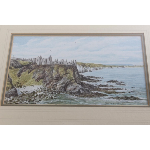 653 - A pair of framed prints 'Ballintoy Harbour' and 'Dunluce Castle' by Martin D Cooke.