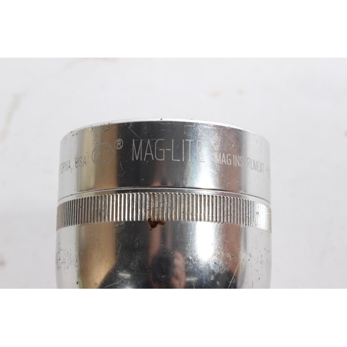 655 - A Mag-Lite torch measuring 26cm.