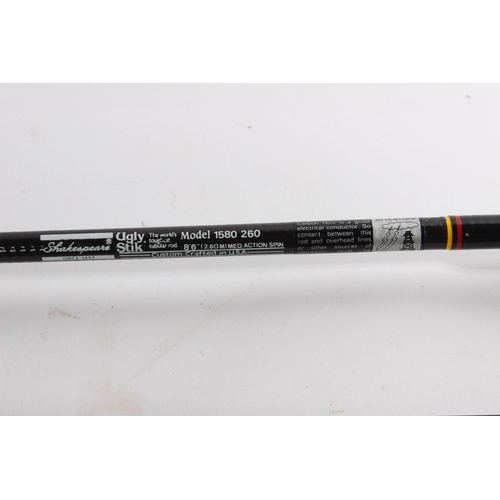 663 - A Shakespeare Ugly Stik 580260 fishing rod and bag.