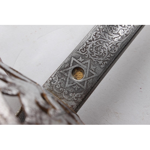 665 - An antique Royal Marine Light Infantry 'Gibraltar' sword with engraved blade and snakeskin handle, n... 