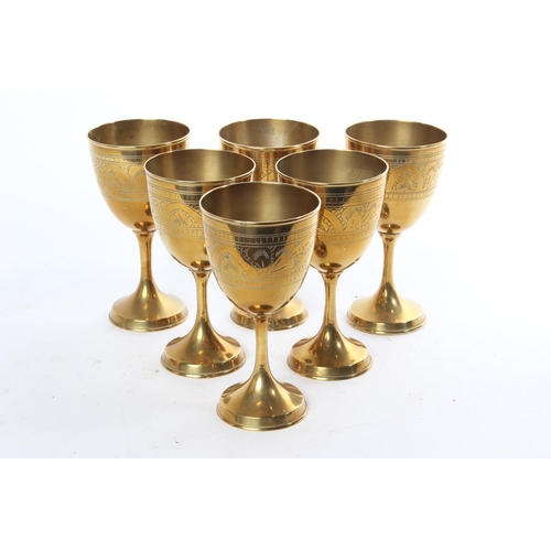 670 - A set of six brass goblets.