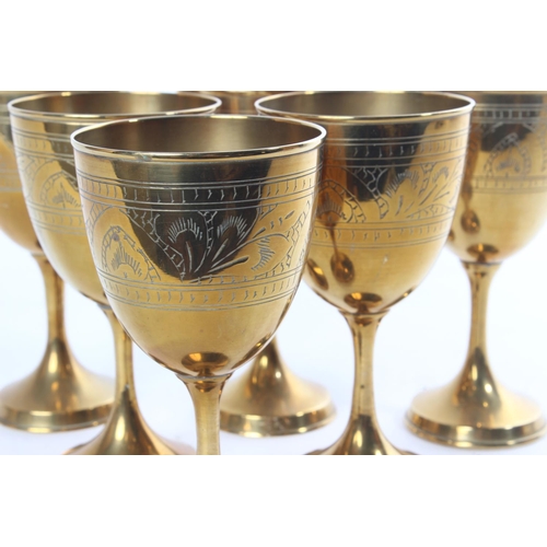 670 - A set of six brass goblets.