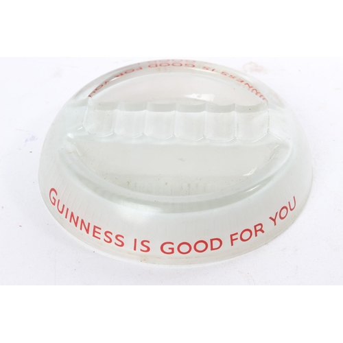 673 - A vintage 'Guinness is Good For You' glass ashtray.