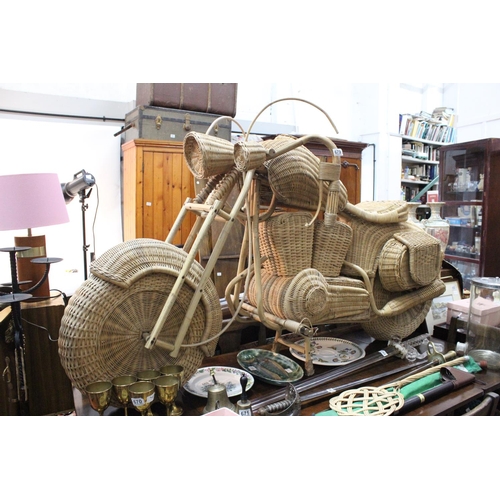 679 - A stunning vintage full sized rattan motorbike.