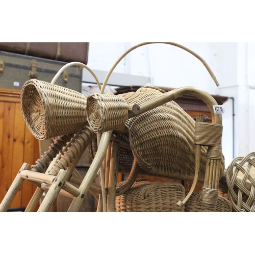 679 - A stunning vintage full sized rattan motorbike.