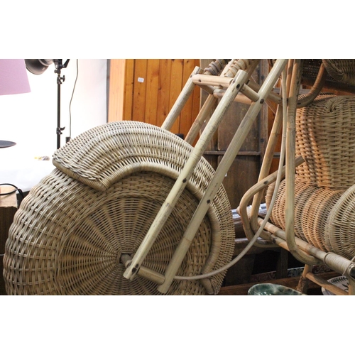 679 - A stunning vintage full sized rattan motorbike.