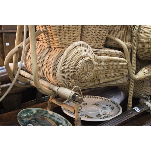 679 - A stunning vintage full sized rattan motorbike.