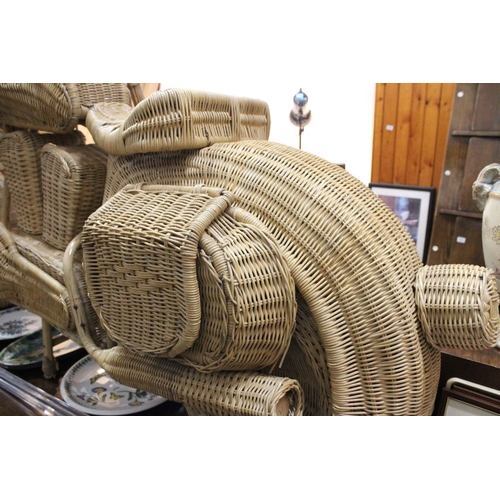 679 - A stunning vintage full sized rattan motorbike.