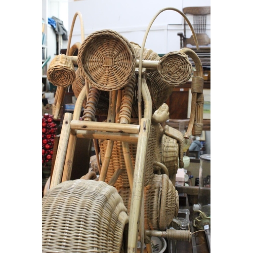 679 - A stunning vintage full sized rattan motorbike.