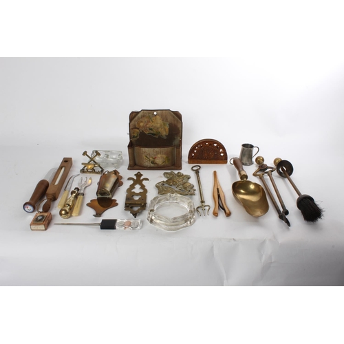 690 - A job lot to include a letter opener, glove stretchers, a brass ornament of horse and rider and lots... 