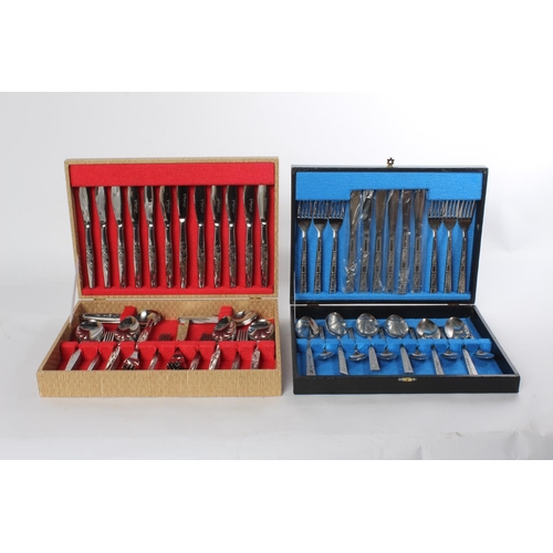 693 - Two vintage cased cutlery sets.