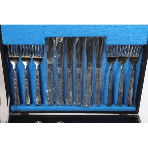 693 - Two vintage cased cutlery sets.