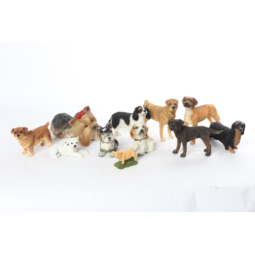 694 - A large collection of dog ornaments and more.