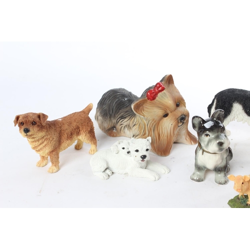 694 - A large collection of dog ornaments and more.