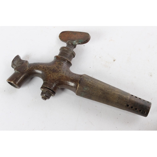 696 - Two Antique brass spigots/ keg taps.