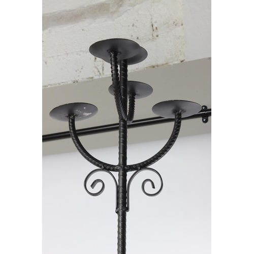 706 - A tall five branch candleholder.