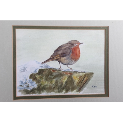 730 - A framed watercolour of a robin signed JK 96, two framed Laura Ashley pictures signed A Fletcher and... 